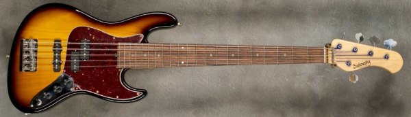 MODEL: 5-21 Vintage,
SERIAL: #3820,
FINISH: '59 burst,
BODY: Chambered Swamp Ash,
WEIGHT: 8.60 lbs,
NECK: Maple with thin matte nitro finish and 12" radius, 1 7/8" nut width,
FINGERBOARD: Morado,
PICKGUARD: Tortoise,
HARDWARE: Chrome,
PICKUPS: Sadowsky Humcancelling P/J,
PREAMP: Sadowsky preamp with vintage tone control