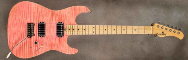 MODEL: S-Style Guitar Standard (pre-owned),
SERIAL: #5619,
FINISH: Bonnie Pink finish with scraped binding on top,
BODY: Alder with Flame Maple Top,
WEIGHT: 6.95 lbs,
NECK: Maple with thin matte nitro finish and 12" radius, 1-11/16” nut width,
FINGERBOARD: Maple,
PICKGUARD: None,
HARDWARE: Chrome,
PICKUPS: Sadowsky PAF style pickups,
PREAMP: Single volume, Sadowsky mid boost preamp, 5-way Mega Switch