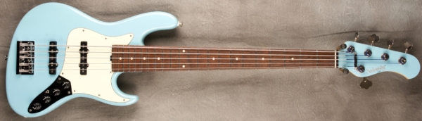 MODEL: 5-22 Vintage Will Lee,
SERIAL: #7246,
FINISH: Sonic Blue with matching headstock,
BODY: Chambered Alder,
WEIGHT: 8.69 lbs,
NECK: Maple with thin matte nitro finish,
FINGERBOARD: Brazillian Rosewood, 12″ radius, 1 7/8″ nut width,
PICKGUARD: Mint,
HARDWARE: Chrome,
PICKUPS: Sadowsky single coil, 60's location JJ,
PREAMP: Sadowsky preamp with vintage tone control and mid boost circuit