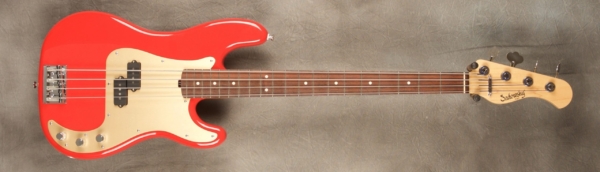 MODEL: 4-20 Vintage P,
SERIAL: #7260,
FINISH: Fiesta red,
BODY: Solid alder,
WEIGHT: 8.77 lbs,
NECK: Maple with thin matte nitro finish,
FINGERBOARD: Brazilian rosewood, 9″ radius, 1.75″ nut width,
PICKGUARD: Anodized gold,
HARDWARE: Chrome,
PICKUPS: Sadowsky humcancelling P,
PREAMP: Sadowsky preamp with vintage tone control