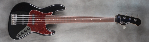 MODEL: 5-20 Vintage J,
SERIAL: #7367,
FINISH: Pearl black,
BODY: Chambered alder,
WEIGHT: 8.21 lbs,
NECK: Maple with thin matte nitro finish,
FINGERBOARD: Amazon rosewood, 12″ radius, 1.75″ nut width,
PICKGUARD: Tortoise shell,
HARDWARE: Chrome,
PICKUPS: Sadowsky single coil J,
PREAMP: Sadowsky preamp with vintage tone control