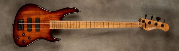 MODEL: 4-24 Standard Modern,
SERIAL: #7387,
FINISH: 59 burst,
BODY: Koa on chambered swamp ash,
NECK: Roasted flame maple with thin matte nitro finish,
FINGERBOARD: Roasted curly maple, 12″ radius, 1.5″ nut width,
PICKGUARD: none,
HARDWARE: Black,
PICKUPS: Sadowsky soapbar in modern locations,
PREAMP: Sadowsky preamp with vintage tone control