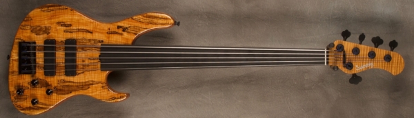 MODEL: Fretless 5-24 Modern J,
SERIAL: #7550,
FINISH: Natural,
BODY: Okume (African Mahogany) with a master grade Spalted Maple top,
WEIGHT: 8.19,
NECK: Roasted Flame Maple with thin matte nitro finish,
FINGERBOARD: Ebony unlined fretless, 12″ radius, 1 7/8″ nut width with side dots,
PICKGUARD: None,
HARDWARE: Black,
PICKUPS: Sadowsky Soapbars in Modern Locations,
PREAMP: Sadowsky preamp with vintage tone control