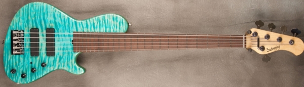 MODEL: 5-24 Modern Single Cut,
SERIAL: #7642,
FINISH: Oahu Blue,
BODY: Chambered alder with Quilted Maple Top,
WEIGHT: 8.22 lbs,
NECK: Maple with thin matte nitro finish,
FINGERBOARD: Amazon Rosewood,
PICKGUARD: None,
HARDWARE: Chrome,
PICKUPS: Sadowsky Soapbars in Modern Locations,
PREAMP: Mid Boost Pre-amp with switchable mid boost and trim pot