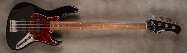 MODEL: 4-22 Vintage Will Lee,
SERIAL: #7839,
FINISH: Pearl black,
BODY: Chambered alder,
WEIGHT: 7.32 lbs,
NECK: Maple with thin matte nitro finish
FINGERBOARD: Madagascar rosewood, 12″ radius, 1.45″ nut width,
PICKGUARD: Tortoise shell,
HARDWARE: Chrome,
PICKUPS: Sadowsky soapbars in 60s J locations,
PREAMP: Sadowsky preamp with vintage tone control with mid boost circuit