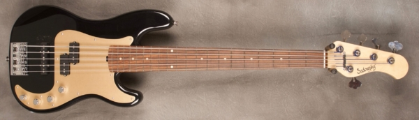 MODEL: 5-20 Vintage PJ-bass,
SERIAL: #8063,
FINISH: Pearl black,
BODY: Chambered alder,
WEIGHT: 8.73,
NECK: Maple with thin matte nitro finish,
FINGERBOARD: Morado, 12″ radius, 1.875″ nut width,
PICKGUARD: Anodized gold,
HARDWARE: Chrome,
PICKUPS: Sadowsky humcancelling PJ,
PREAMP: Sadowsky preamp with vintage tone control