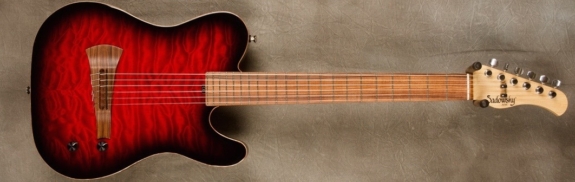 MODEL: Standard Electric Nylon,
SERIAL: #8119,
FINISH: Custom Narrow Band Red Burst,
BODY: Chambered Okoume with Quilted Maple Top,
WEIGHT: 5.28 lbs,
NECK: Maple with thin matte nitro finish,
FINGERBOARD: Morado, 12″ radius, 1 7/8″ nut width,
PICKGUARD: none,
HARDWARE: Chrome,
PICKUPS: Barbera under-saddle,
PREAMP: Sadowsky buffer preamp