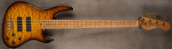 MODEL: Standard 4-24 Modern,
SERIAL: #8132,
FINISH: Caramel Burst,
BODY: Quilted Maple Top on Chambered Roasted Swamp Ash,
WEIGHT: 7.2,
NECK: Roasted Birdseye Maple with thin matte nitro finish,
FINGERBOARD: Roasted Birdseye Maple, 12″ radius, 1.45″ nut width,
PICKGUARD: None,
HARDWARE: Gold,
PICKUPS: Sadowsky soapbar,
PREAMP: Sadowsky preamp with vintage tone control