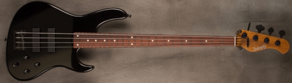 MODEL: 4-24 Modern,
SERIAL: #8147,
FINISH: Black Pearl (Glossy Finish),
BODY: Chambered Alder,
WEIGHT: 7.68,
NECK: Roasted Maple with thin matte nitro finish,
FINGERBOARD: Madagascar Rosewood, 12″ radius, 1.45″ nut width,
PICKGUARD: None,
HARDWARE: Black,
PICKUPS: Sadowsky soapbar,
PREAMP: Sadowsky preamp with vintage tone control