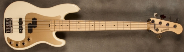 MODEL: 5-21 P5,
SERIAL: #8161,
FINISH: Olympic white,
BODY: Chambered Ash,
WEIGHT: 8.51 lbs,
NECK: Maple with thin matte nitro finish,
FINGERBOARD: Maple. 12’ radius, 1 7/8” nut width,
PICKGUARD: Adonized Gold,
HARDWARE: Chrome,
PICKUPS: Sadowsky P/J,
PREAMP: Sadowsky preamp with vintage tone control