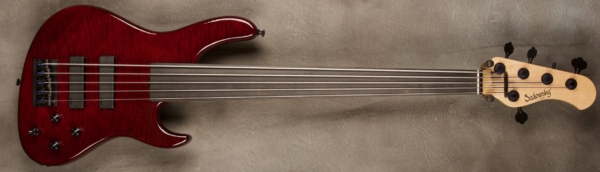 MODEL: Fretless 5-24 Standard J,
SERIAL: #8179,
FINISH: Deep Burgundy Wine,
BODY: Quilted Maple,
WEIGHT: 8.7,
NECK: Maple with thin matte nitro finish,
FINGERBOARD: Ebony unlined fretless, 12″ radius, 1.875″ nut width with side dots,
PICKGUARD: None,
HARDWARE: Black,
PICKUPS: Sadowsky Soapbars in Modern Locations,
PREAMP: Sadowsky preamp with vintage tone control