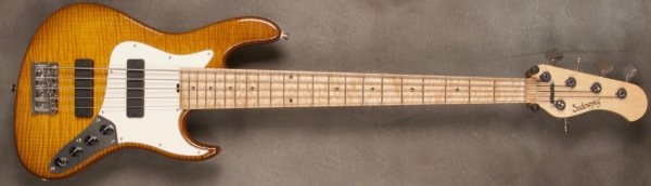 MODEL: 5-22 Will Lee,
SERIAL: #8201,
FINISH: Caramel Burst,
BODY: Chambered Ash with Flame Maple Top and Accent Line,
WEIGHT: 8.29 lbs,
NECK: Maple with thin matte nitro finish and 12" radius and 1 3/4 nut width,
FINGERBOARD: Curly Maple,
PICKGUARD: Parchment,
HARDWARE: Chrome,
PICKUPS: Sadowsky Soapbars in 60's Location,
PREAMP: Sadowsky preamp with vintage tone control and mid boost circuit