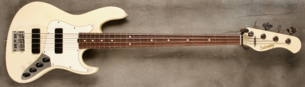 MODEL: 4-22 Will Lee,
SERIAL: #8238,
FINISH: Olympic White,
BODY: Chambered Alder,
WEIGHT: 7.74 lbs,
NECK: Maple with thin matte nitro finish and 12" radius, 1.45" nut width, and matching headstock,
FINGERBOARD: Amazon Rosewood,
PICKGUARD: Parchment,
HARDWARE: Chrome,
PICKUPS: Sadowsky Soapbars in 60's Location,
PREAMP: Sadowsky preamp with vintage tone control and mid boost circuit