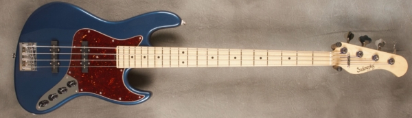 MODEL: 4-21 Vintage J-bass,
SERIAL: #8298,
FINISH: Dark Lake Placid Blue,
BODY: Chambered Swamp Ash,
WEIGHT: 8.04 lbs,
NECK: Maple with thin matte nitro finish,
FINGERBOARD: Maple. 12’ radius, 1.5” nut width,
PICKGUARD: Tortoise,
HARDWARE: Chrome,
PICKUPS: Sadowsky Humcancelling, 60’s Location,
PREAMP: Sadowsky preamp with vintage tone control