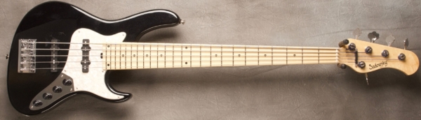 MODEL: 5-24 Vintage,
SERIAL: #8340,
FINISH: Black Pearl (glossy finish),
BODY: Chambered Swamp Ash,
WEIGHT: 8.36,
NECK: Maple with thin matte nitro finish,
FINGERBOARD: Maple, 12″ radius, 1.875″ nut width,
PICKGUARD: Flat Black,
HARDWARE: Black,
PICKUPS: Sadowsky Humcancelling J,
PREAMP: Sadowsky preamp with vintage tone control