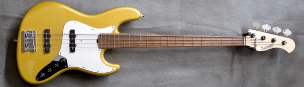 MODEL: 4-20 Vintage (full size body),
SERIAL: #8364,
FINISH: Shoreline Gold Metallic,
BODY: Chambered Alder,
WEIGHT: 8.57 lbs,
NECK: Maple with thin matte nitro finish and 12" radius, 1.5" nut width,
FINGERBOARD: Morado with no dots,
PICKGUARD: Parchment,
HARDWARE: Chrome,
PICKUPS: Sadowsky Single Coil, 70's Location,
PREAMP: Sadowsky preamp with vintage tone control