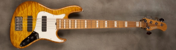 MODEL: 5-22 Will Lee,
SERIAL: #8440,
FINISH: Caramel Burst,
BODY: Chambered Ash with Quilted Maple Top,
WEIGHT: 8.29 lbs,
NECK: Roasted Maple with thin matte nitro finish and 12" radius and 1 3/4 nut width,
FINGERBOARD: Roasted Maple with Pearl Block Inlays,
PICKGUARD: Parchment,
HARDWARE: Chrome,
PICKUPS: Sadowsky Soapbars in 60's Location,
PREAMP: Sadowsky preamp with vintage tone control and mid boost circuit