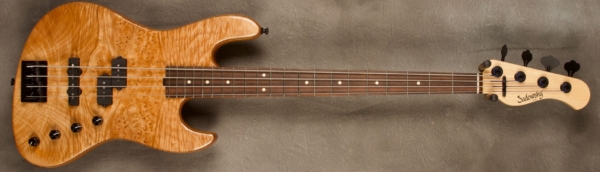 MODEL: 4-21 Verdine White Signature,
SERIAL: #8446,
FINISH: Natural,
BODY: Chambered Alder with Maple Burl top,
WEIGHT: 7.60 lbs,
NECK: Maple with thin matte nitro finish and 12" radius, 1.5" nut width,
FINGERBOARD: Madagascar Rosewood,
PICKGUARD: None,
HARDWARE: Black,
PICKUPS: Sadowsky Humcancelling P/J,
PREAMP: Sadowsky preamp with vintage tone control