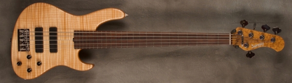 MODEL: 5-24 Modern,
SERIAL: #8447,
FINISH: Natural,
BODY: Chambered Alder with Flame Maple Top,
WEIGHT: 8.12 lbs,
NECK: Roasted Birdseye Maple neck with thin matte nitro finish,
FINGERBOARD: Amazon Rosewood 12’ radius, 1 7/8” nut width no dots,
PICKGUARD: None,
HARDWARE: Chrome,
PICKUPS: Sadowsky Soapbars in modern locations,
PREAMP: Sadowsky preamp with vintage tone control