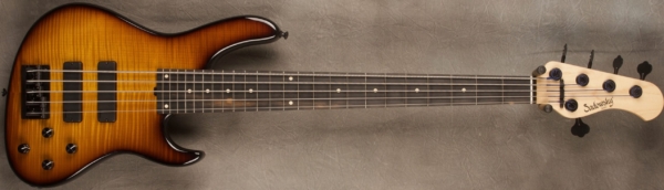 MODEL: 5-24 Modern,
SERIAL: #8478,
FINISH: '59 Burst,
BODY: Chambered Swamp Ash with Flame Maple Top,
WEIGHT: 8.12 lbs,
NECK: Maple neck with thin matte nitro finish,
FINGERBOARD: Ebony 12’ radius, 1 7/8” nut width custom inlay clay dots,
PICKGUARD: None,
HARDWARE: Black,
PICKUPS: Sadowsky Soapbars in modern locations,
PREAMP: Sadowsky preamp with vintage tone control