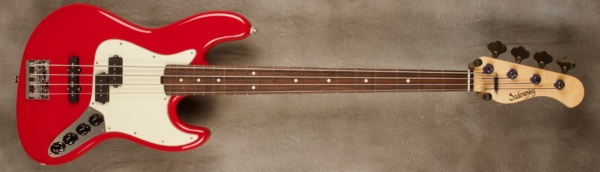 MODEL: 4-20 P/J Vintage,
SERIAL: #8479,
FINISH: Dakota Red,
BODY: Full-Sized Chambered Alder,
WEIGHT: 8.39 lbs,
NECK: Maple with thin matte nitro finish and 12" radius and 1.5" nut width,
FINGERBOARD: Brazilian Rosewood,
PICKGUARD: Mint,
HARDWARE: Chrome,
PICKUPS: Sadowsky P/J,
PREAMP: Sadowsky preamp with vintage tone control