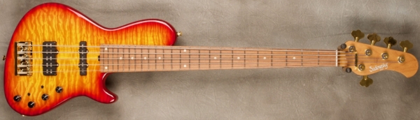 MODEL: 5-24 Single Cut 5-String Bass Standard,
SERIAL: #8544,
FINISH: Custom Cherry Burst,
BODY: Chambered Solid One Piece Light Weight Ash with Master Grade Quilted Maple Top,
WEIGHT: 8.02 lbs,
NECK: Roasted Maple with thin matte nitro finish,
FINGERBOARD: Morado 12" radius, 1 3/4” nut width,
PICKGUARD: None,
HARDWARE: Gold,
PICKUPS: Sadowsky hum cancelling J and Super J,
PREAMP: Sadowsky mid-boost preamp with vintage tone control