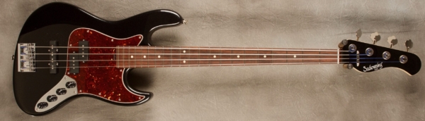 MODEL: 4-21 Standard J-bass,
SERIAL: #8561,
FINISH: Black Pearl,
BODY: Chambered Alder,
WEIGHT: 8.09 lbs,
NECK: Maple with thin matte nitro finish and matching headstock,
FINGERBOARD: Amazon Rosewood, 12’ radius, 1.5” nut width,
PICKGUARD: Tortoise,
HARDWARE: Chrome,
PICKUPS: Sadowsky P/J, 60’s Location,
PREAMP: Sadowsky preamp with vintage tone control