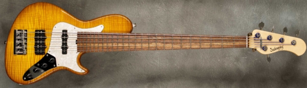 MODEL: Single Cut 5-24 Vintage,
SERIAL: #8710,
FINISH: Caramel burst,
BODY: Chambered Alder with Flame Maple top,
WEIGHT: 8.39 lbs,
NECK: Maple with thin matte nitro finish,
FINGERBOARD: Chechen 12" radius, 1 3/4” nut width,
PICKGUARD: Pearl,
HARDWARE: Chrome,
PICKUPS: Sadowsky Humcancelling Super J/J,
PREAMP: Sadowsky mid-boost preamp with vintage tone control