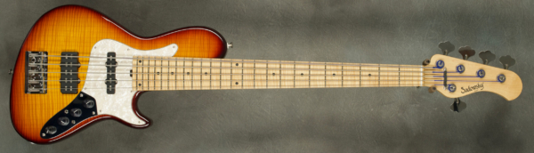 MODEL: 5-24 Single Cut,
SERIAL: #8738,
FINISH: Dark Cherry Burst,
BODY: Chambered Swamp Ash with Flame Maple Top,
WEIGHT: 8.40 lbs,
NECK: Maple with thin matte nitro finish and 12" radius, 1 7/8" nut width,
FINGERBOARD: Flame Maple, Lined Fretless with dots,
PICKGUARD: Vintage Pearl,
HARDWARE: Chrome,
PICKUPS: Sadowsky Humcancelling Super J/J,
PREAMP: Sadowsky mid-boost preamp with vintage tone control