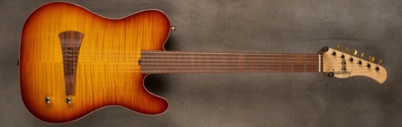 MODEL: Standard Electric Nylon,
SERIAL: #8742,
FINISH: Dark Cherry Burst,
BODY: Chambered Okoume with Flame Maple Top,
WEIGHT: 5.73 lbs,
NECK: Maple with thin matte nitro finish,
FINGERBOARD: Morado, 12″ radius, 1 7/8″ nut width,
PICKGUARD: none,
HARDWARE: Gold,
PICKUPS: Barbera under-saddle,
PREAMP: Sadowsky buffer preamp