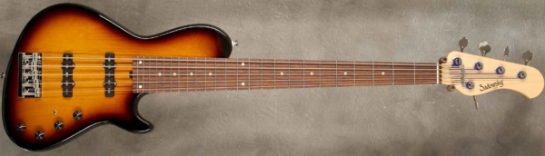 MODEL: 5-24 Single Cut Standard,
SERIAL: #8826,
FINISH: '59 Burst,
BODY: Chambered Alder,
WEIGHT: 7.89 lbs,
NECK: Maple with thin matte nitro finish and 12" radius, 1 3/4" nut width,
FINGERBOARD: Amazon Rosewood,
PICKGUARD: None,
HARDWARE: Chrome,
PICKUPS:
Sadowsky Humcancelling in 60's Locations,
PREAMP: Sadowsky mid-boost preamp with vintage tone control