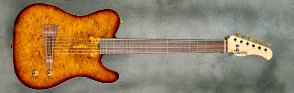 MODEL: Standard Electric Nylon,
SERIAL: #8940,
FINISH: '59 Burst,
BODY: Chambered Alder with Maple Burl Top,
WEIGHT: 5.84 lbs,
NECK: Maple with thin matte nitro finish
FINGERBOARD: Morado, 12″ radius, 1 7/8″ nut width
PICKGUARD: None
HARDWARE: Gold
PICKUPS: Barbera under-saddle
PREAMP: Sadowsky buffer preamp
