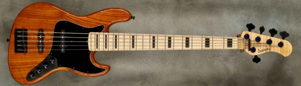 MODEL: 5-20 Ultra Vintage,
SERIAL: #8969,
FINISH: Natural,
BODY: Chambered Roasted Swamp Ash,
WEIGHT: 9.02 lbs,
NECK: Roasted Master Grade Flame Maple with thin matte nitro finish and 12" radius, 1 7/8" nut width,
FINGERBOARD: Flame Maple with custom black blocks inlay and standard size frets,
PICKGUARD: BWB,
HARDWARE: Black,
PICKUPS: Sadowsky Humcancelling in 60's locations,
PREAMP: Sadowsky preamp with vintage tone control
