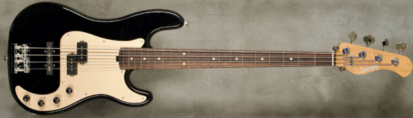 Model 4-20 P/J Vintage,
Serial #8528,
Finish Black Pearl,
Body Chambered Alder,
Weight 8.23 lbs,
Neck Maple with thin matte nitro finish,
Radius/Nut 12" radius, 1.5" nut width,
Fingerboard Amazon Rosewood,
Pickguard Anodized Gold,
Hardware Chrome,
Pickups Sadowsky P/J,
Preamp Sadowsky preamp with vintage tone control