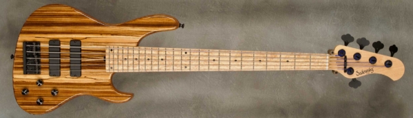 Model 5-24 Modern
Serial #9290
Finish Natural
Body Chambered Roasted Swamp Ash w/ Zebra Wood Top
Weight 8.27 lbs
Neck Maple with thin matte nitro finish
Radius/Nut 12" radius, 1 7/8" nut width
Fingerboard Birdseye Maple
Pickguard None
Hardware Black
Pickups Sadowsky Soapbars in Modern Positions
Preamp Sadowsky preamp with vintage tone control