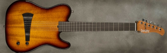 Model Electric Nylon Guitar,
Serial #9267,
Finish '59 Burst,
Body Chambered Okoume,
Weight 5.38 lbs,
Neck Mahogany with thin matte nitro finish,
Radius/Nut 12" radius, 1 7/8" nut width,
Fingerboard Ebony,
Pickguard None,
Hardware Chrome,
Pickups Custom Barbera Pickup,
Preamp Sadowsky buffer preamp
