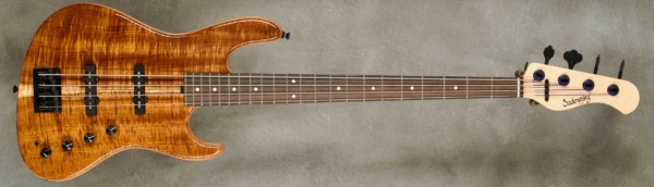 Model 4-22 Will Lee Standard
Serial #9345
Finish Natural
Body Chambered Alder w/ Tasmanian Blackwood Top
Weight 7.42 lbs
Neck Maple with thin matte nitro finish
Radius/Nut 12" radius, 1.45" nut width
Fingerboard Amazon Rosewood with MOP dots
Pickguard None
Hardware Black
Pickups Sadowsky Humcancelling J in 60's Positions
Preamp Sadowsky preamp with mid-boost preamp and vintage tone control