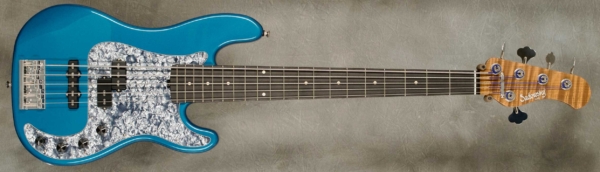 Model P5 5-20 Vintage
Serial #9341
Finish Ocean Turquoise Metallic
Body Chambered Alder
Weight 9.04 lbs
Neck Master Grade Roasted Flame Maple with thin matte nitro finish
Radius/Nut 12" radius, 1 7/8" nut width
Fingerboard Ebony
Pickguard Black Pearl
Hardware Chrome
Pickups Sadowsky P/J
Preamp Sadowsky preamp with vintage tone control