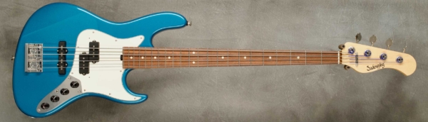 Model 4-22 Will Lee Vintage
Serial #8948
Finish Lake Placid Blue
Body Chambered Alder
Weight 8.14 lbs
Neck Maple with thin matte nitro finish
Radius/Nut 12" radius, 1.45" nut width
Fingerboard Morado
Pickguard Parchment
Hardware Chrome with Drop D Tuner
Pickups Sadowsky Humcancelling P/J
Preamp Sadowsky preamp with mid-boost preamp and vintage tone control
