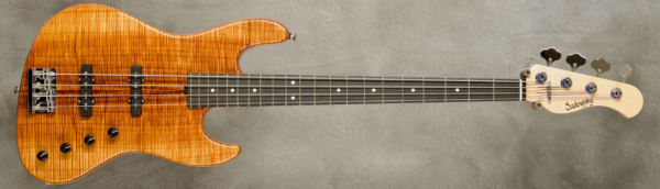 Model 4-21 Standard
Serial #9334
Finish Natural w/ Special Stash Koa top
Body Chambered Alder
Weight 8.17 lbs
Neck Maple with thin matte nitro finish
Radius/Nut 12" radius, 1.5" nut width
Fingerboard Ebony
Pickguard None
Hardware Chrome
Pickups Sadowsky Humcancelling JJ in 60's Locations
Preamp Sadowsky preamp with vintage tone control
