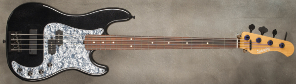 Model P4 Vintage
Serial #9332
Finish Black Pearl
Body Chambered Alder
Weight 7.57 lbs
Neck Roasted Maple with thin matte nitro finish
Radius/Nut 9" radius, 1 .5" (39 mm) nut width
Fingerboard Brazilian Rosewood (US Shipping Only)
Pickguard Black Pearl
Hardware Black
Pickups Sadowsky P/ Soap
Preamp Sadowsky preamp with vintage tone control