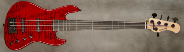 Model 5-21 Standard
Serial #9372
Finish Transparent Red with Black Stain Undercoat
Body Chambered Swamp Ash w/ Quilted Maple Top
Weight 8.22 lbs
Neck Maple with thin matte nitro finish
Radius/Nut 12" radius, 1 3/4" nut width
Fingerboard Ebony
Pickguard None
Hardware Black
Pickups Sadowsky Humcancelling J's in 70's positions
Preamp Sadowsky preamp with vintage tone control