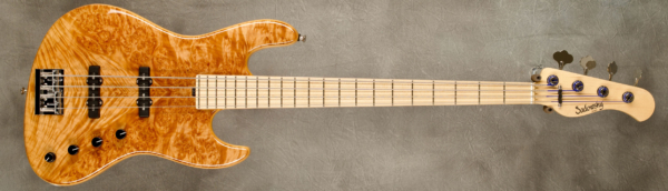 Model 4-21 Standard
Serial #9440
Finish Vintage Tint
Body Chambered Swamp Ash w/ Maple Burl Top
Weight 7.73 lbs
Neck Maple with thin matte nitro finish
Radius/Nut 12" radius, 1.5" (39mm) nut width
Fingerboard Maple
Pickguard None
Hardware Chrome
Pickups Sadowsky Humcancelling JJ in 60's Locations
Preamp Sadowsky preamp with vintage tone control