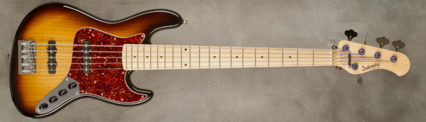 Model 5-20 Vintage
Serial #9423
Finish '59 Burst
Body Chambered Swamp Ash
Weight 8.38 lbs
Neck Maple with thin matte nitro finish
Radius/Nut 12" radius, 1 7/8" (47.625mm) nut width
Fingerboard Maple
Pickguard Tortoise
Hardware Chrome
Pickups Sadowsky Humcancelling J/J in 70's Locations
Preamp Sadowsky preamp with vintage tone control