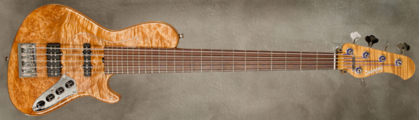 Model 5-24 Single Cut Vintage.
Serial #9425
Finish Natural
Body Chambered Alder with Maple Burl top
Weight 8.69 lbs
Neck Roasted Flame Maple with matte nitro + oil finish
Radius/Nut 12" radius, 1 7/8" (47.625mm) nut width
Fingerboard
Amazon Rosewood
Pickguard Plexi
Hardware Chrome
Pickups Sadowsky HC J/Super J
Preamp Sadowsky mid-boost preamp with vintage tone control