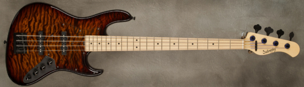 Model 4-22 Will Lee Vintage
Serial #9436
Finish Tiger's Eye Burst
Body Chambered Swamp Ash w/ Quilt Maple Top
Weight 7.90 lbs
Neck Maple with thin matte nitro finish
Radius/Nut 12" radius, 1.5" (39mm) nut width
Fingerboard Maple
Pickguard Plexi
Hardware Black
Pickups Sadowsky Humcancelling J/J in 60's positions
Preamp Sadowsky mid-boost preamp with vintage tone control
Case Sadowsky Portabag