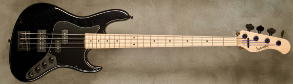 Model 4-22 Will Lee Vintage
Serial #9340
Finish Black Pearl
Body Chambered Swamp Ash
Weight 7.65 lbs
Neck Maple with thin matte nitro finish
Radius/Nut 12" radius, 1.45" nut width
Fingerboard Maple
Pickguard Matte Black B/W/B
Hardware Black w/D Tuner
Pickups Sadowsky P/Super J
Preamp Sadowsky mid-boost preamp with vintage tone control
Case Sadowsky Portabag