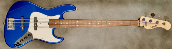 Model 4-21 Vintage
Serial #9382
Finish Cerulean Blue
Body Chambered Okoume
Weight 7.90 lbs
Neck Maple with thin matte nitro finish
Radius/Nut 12" radius, 1.5" (39mm) nut width
Fingerboard Morado
Pickguard Parchment
Hardware Chrome
Pickups Sadowsky Humcancelling J/J in 60's positions
Preamp Sadowsky preamp with vintage tone control
Case Sadowsky Portabag